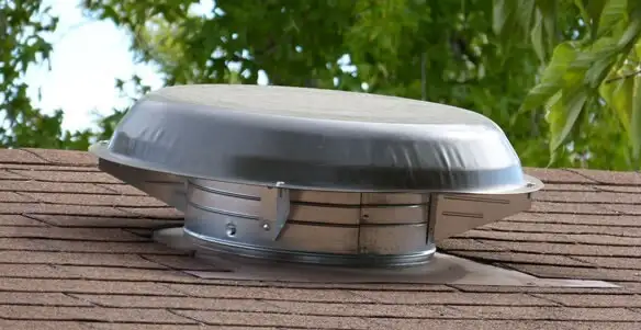 attic fan installation services with low-profile roof ventilation unit in Fort Lauderdale, FL