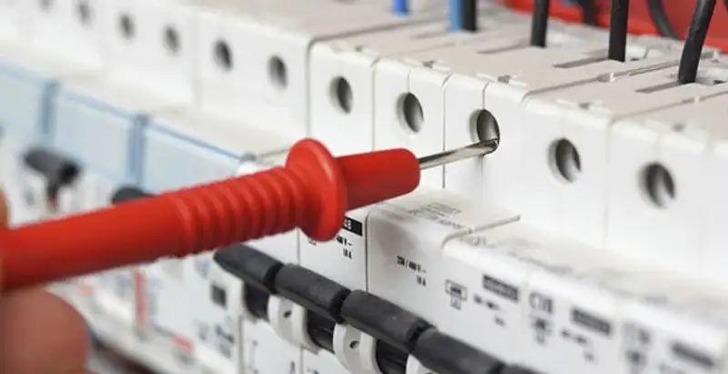 Electrical contractor testing circuit breakers during electrical repair in Deerfield Beach, FL