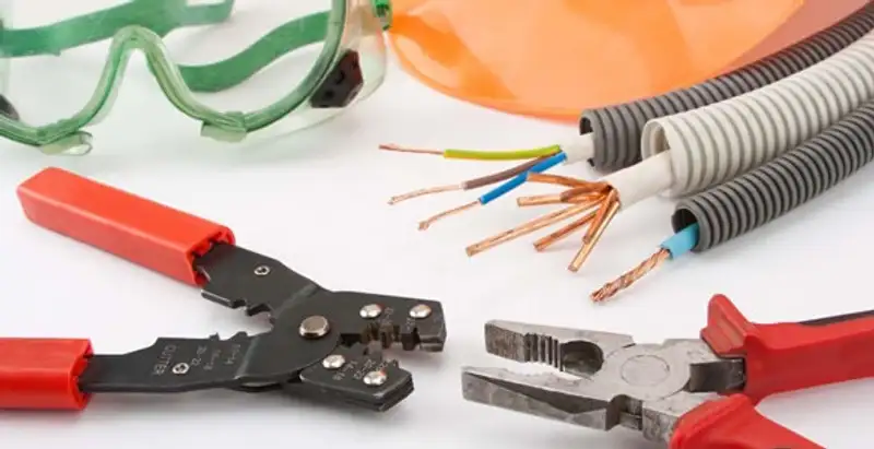 Electrical wiring repair with professional tools and safety equipment in Deerfield Beach, FL