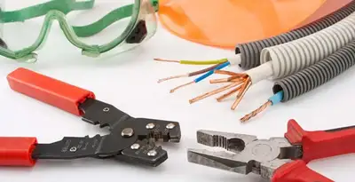 Electrical wiring repair with professional tools and safety equipment in Pompano Beach, FL