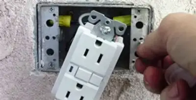 gfci circuits service showing installation of a ground fault circuit interrupter outlet by licensed electricians in Fort Lauderdale, FL