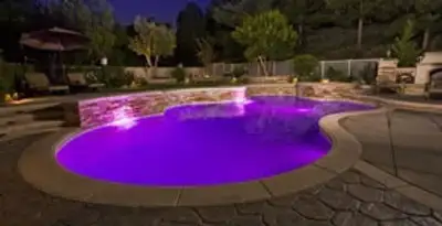 pool light installation and repair services illuminating a residential swimming pool in Fort Lauderdale, FL