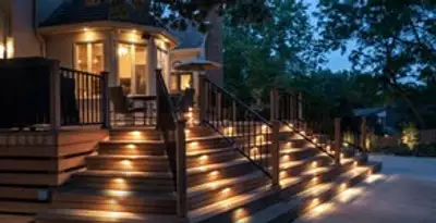 Residential electrician installing outdoor lighting for home safety in Fort Lauderdale, FL